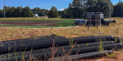 Construction supplies laying on the ground at the Modaus Road sportsplex