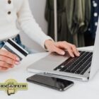 A female is doing business on a laptop