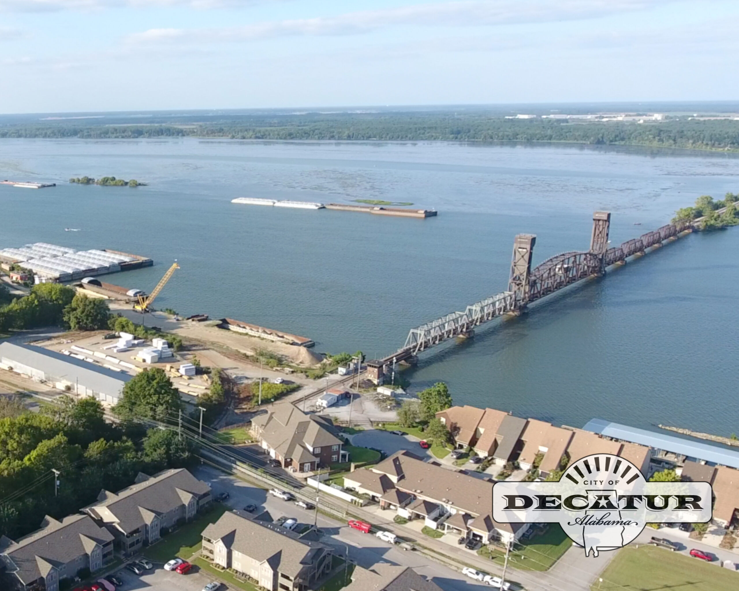 This is an aerial picture of the Tennessee River with the railroad bridge crossing over the water.