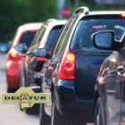 Cars lined up at an intersection.