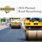This is a graphic with the Decatur logo that states 2026 Planned Road Resurfacing with a picture of road paving equipment at work.