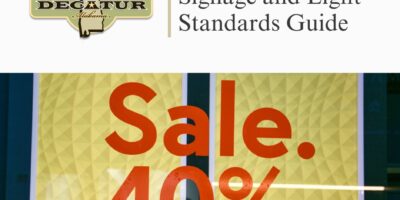 A graphic that states Signage and Light Standards Guide, with a sign that states Sale, 40%.
